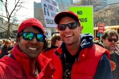 smiling-protesters-909x683