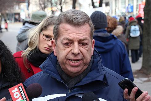 Sam Hammond with media